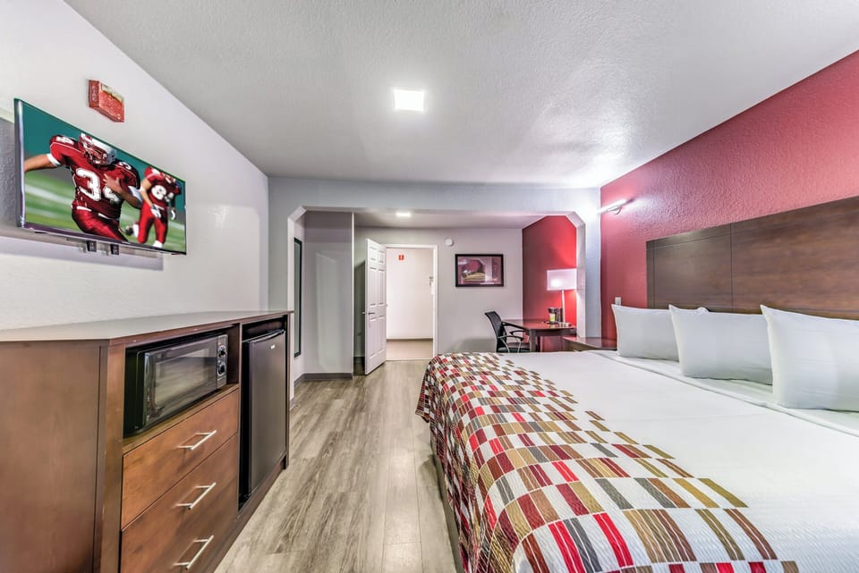 Desk, blackout drapes, cribs (free), WiFi (free)