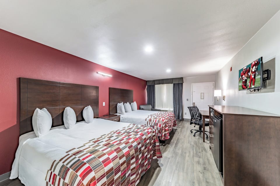 Desk, blackout drapes, cribs (free), WiFi (free)