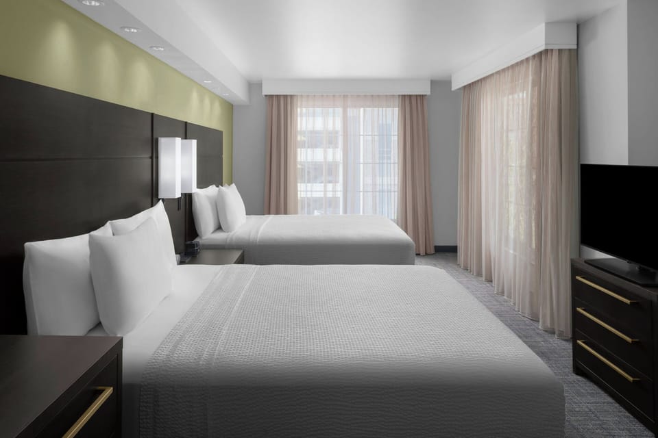 Suite, 1 Bedroom | Desk, laptop workspace, blackout drapes, iron/ironing board