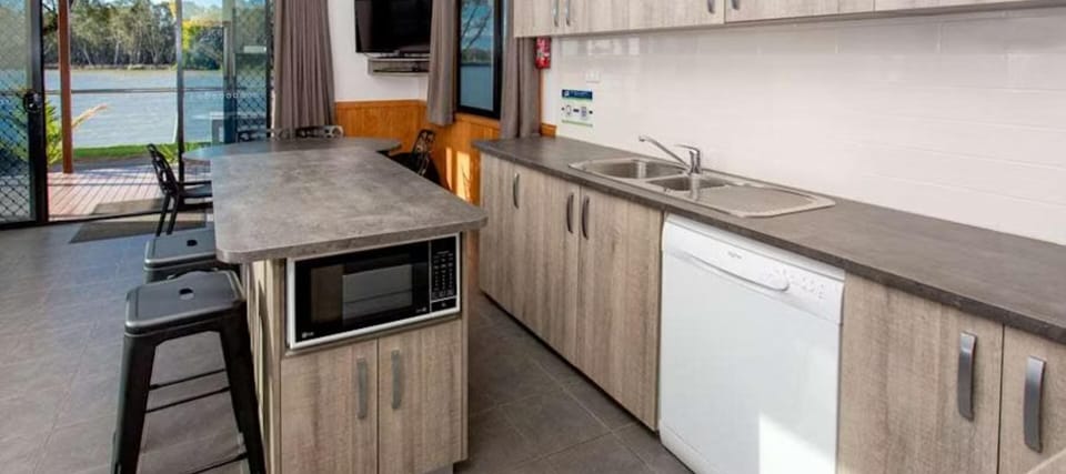 Deluxe 3 Bedroom Riverfront Cabin - Sleeps 8 | Private kitchen | Fridge, microwave, electric kettle, cookware/dishes/utensils