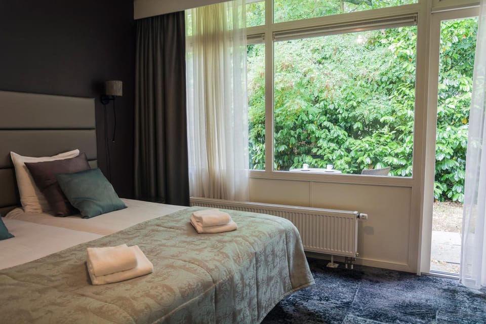 Desk, blackout drapes, soundproofing, iron/ironing board
