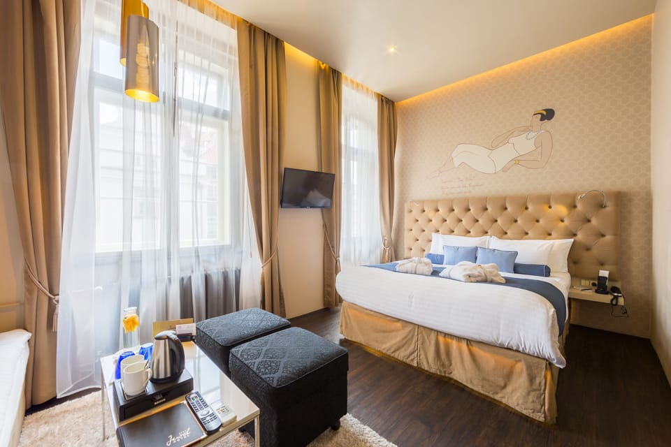 Superior Double or Twin Room | Minibar, in-room safe, desk, iron/ironing board