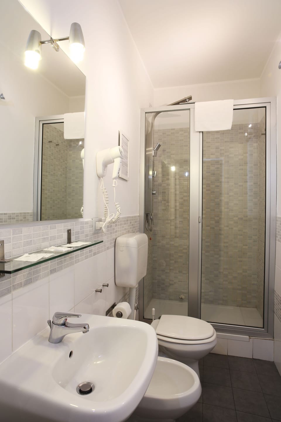 Shower, free toiletries, hair dryer, bidet