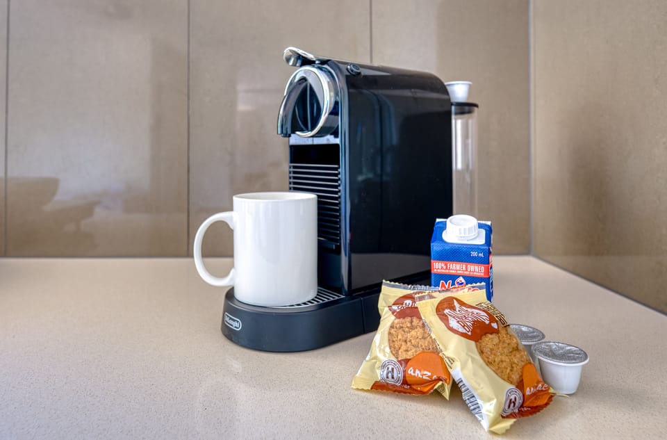 Espresso maker, coffee/tea maker, fridge, microwave