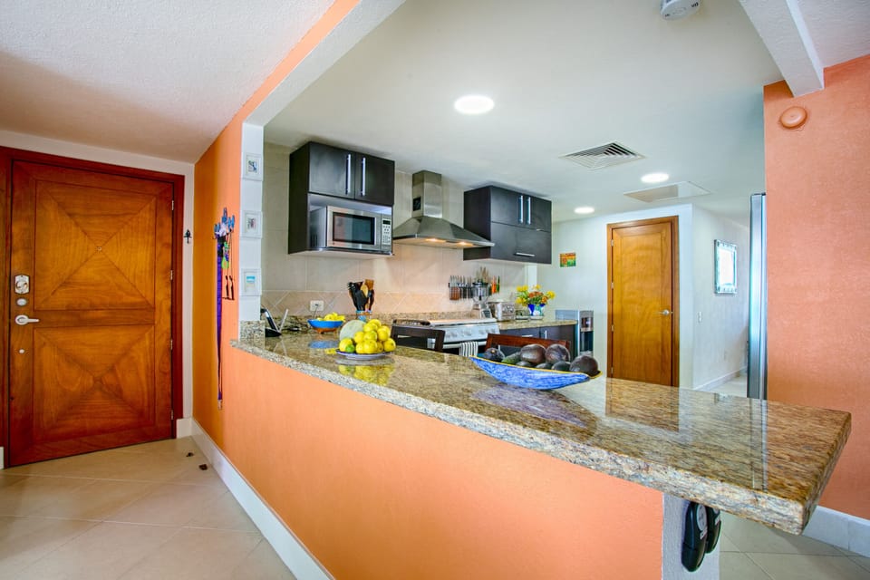 Open floor plan with a large kitchen