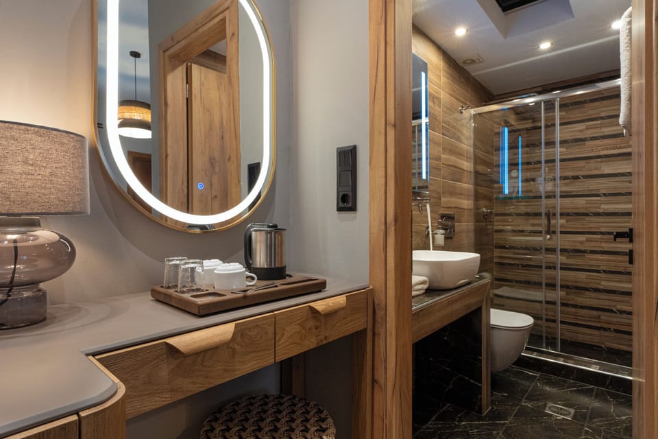 Deluxe Triple Room | Select Comfort beds, minibar, in-room safe, desk