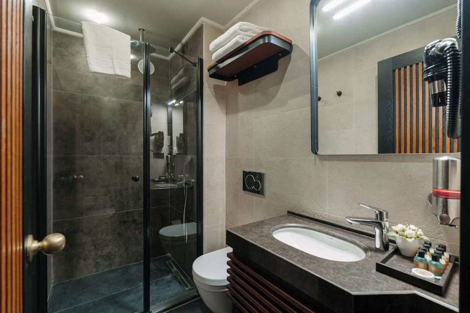 Bathtub, jetted tub, hair dryer, slippers
