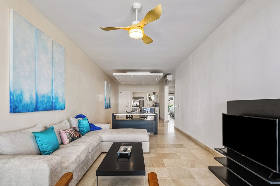 Deluxe Apartment, 2 Bedrooms | Living area | TV, iPod dock