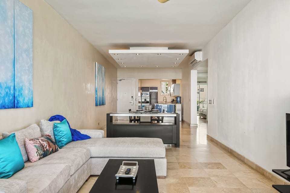 Deluxe Apartment, 2 Bedrooms | Living area | TV, iPod dock