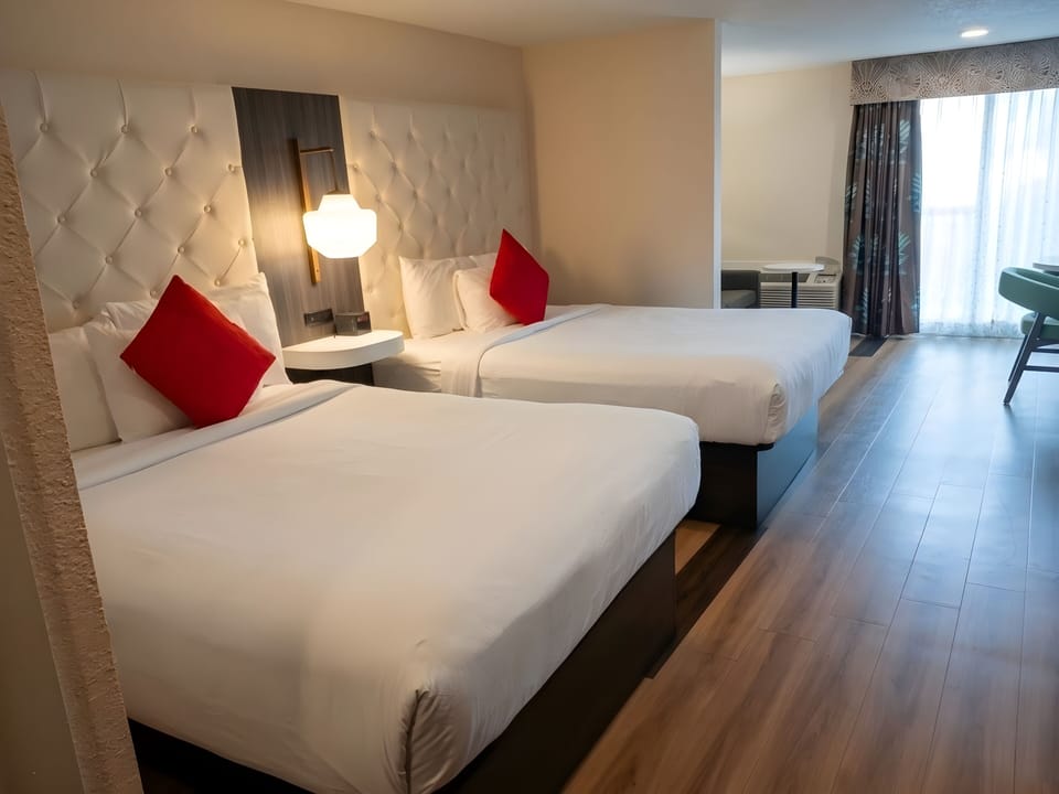 Family Studio Suite, 2 Queen Beds | In-room safe, iron/ironing board, free WiFi, bed sheets