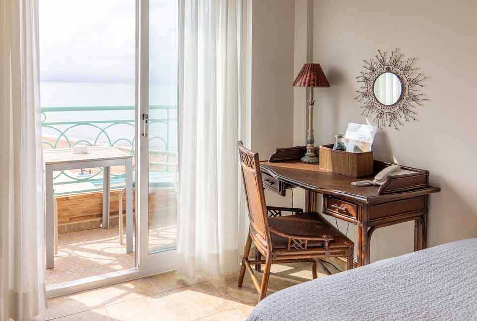 Down comforters, memory foam beds, in-room safe, desk