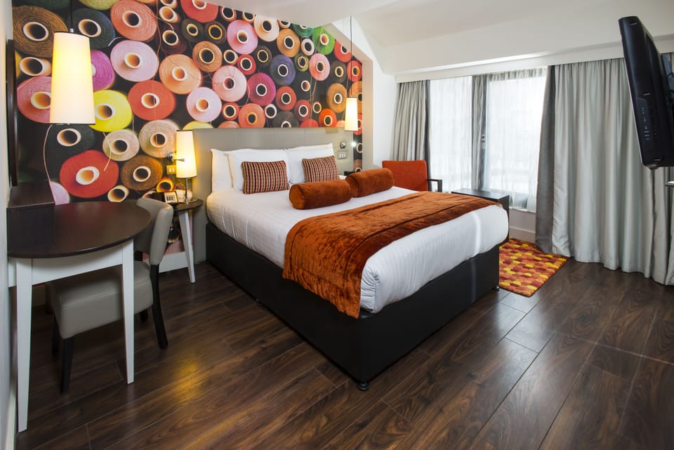 Hypo-allergenic bedding, free minibar, in-room safe, desk