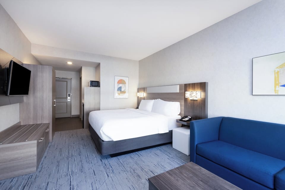 Suite, 2 Bedrooms | Down comforters, in-room safe, desk, laptop workspace