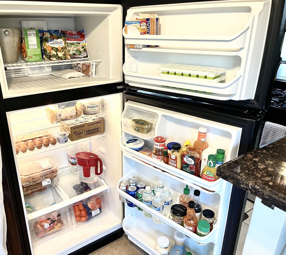 ComplimentaryStockedFridge,Bagels,Muffins,Butter,CreamCheese,Refreshments,Fruit