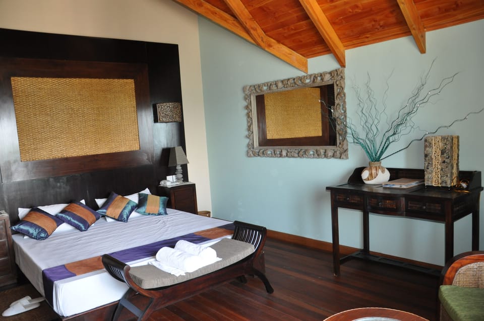Deluxe Room | 4 bedrooms, minibar, in-room safe, desk
