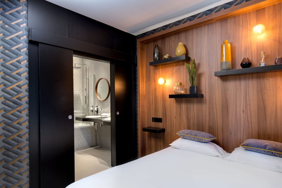 Deluxe Room | Premium bedding, in-room safe, individually decorated