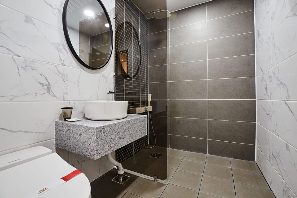 Shower, hair dryer, bathrobes, slippers