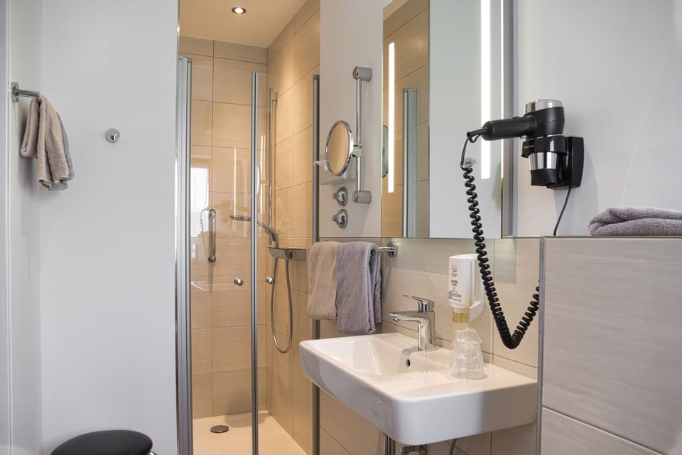 Hair dryer, towels, shampoo