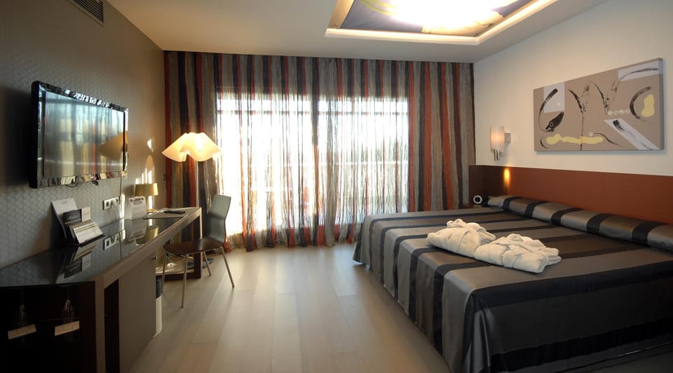 Premium bedding, memory foam beds, minibar, in-room safe