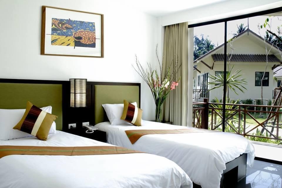 Deluxe Room | Hypo-allergenic bedding, pillowtop beds, minibar, in-room safe