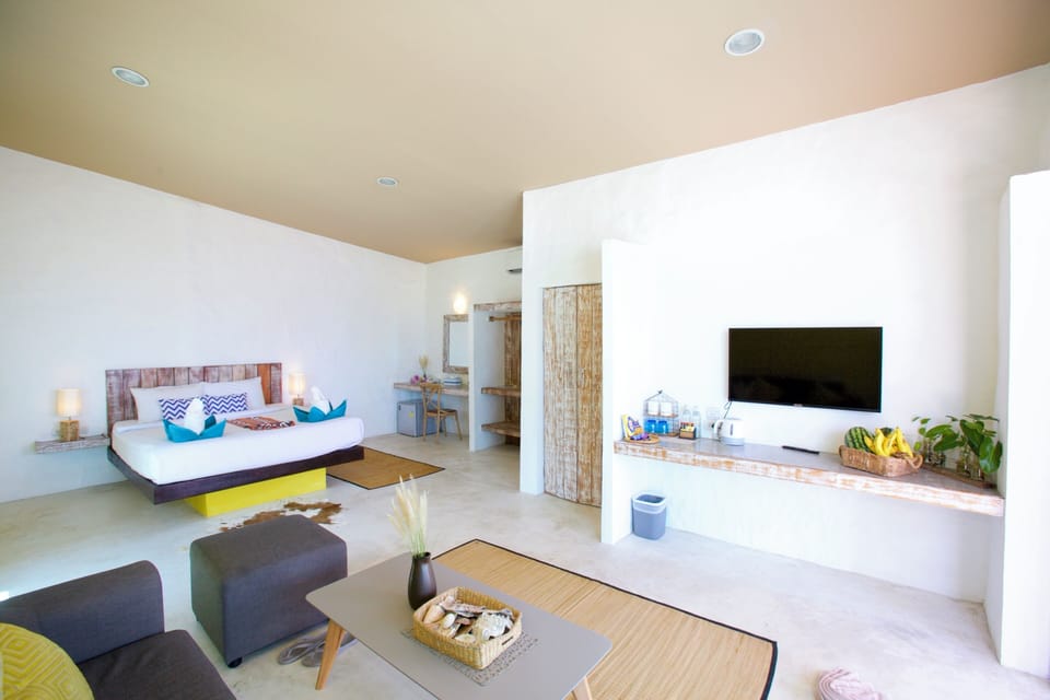 Suite, Beachfront | Hypo-allergenic bedding, minibar, in-room safe, individually decorated