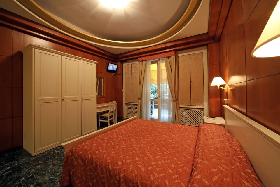 Select Comfort beds, minibar, in-room safe, desk