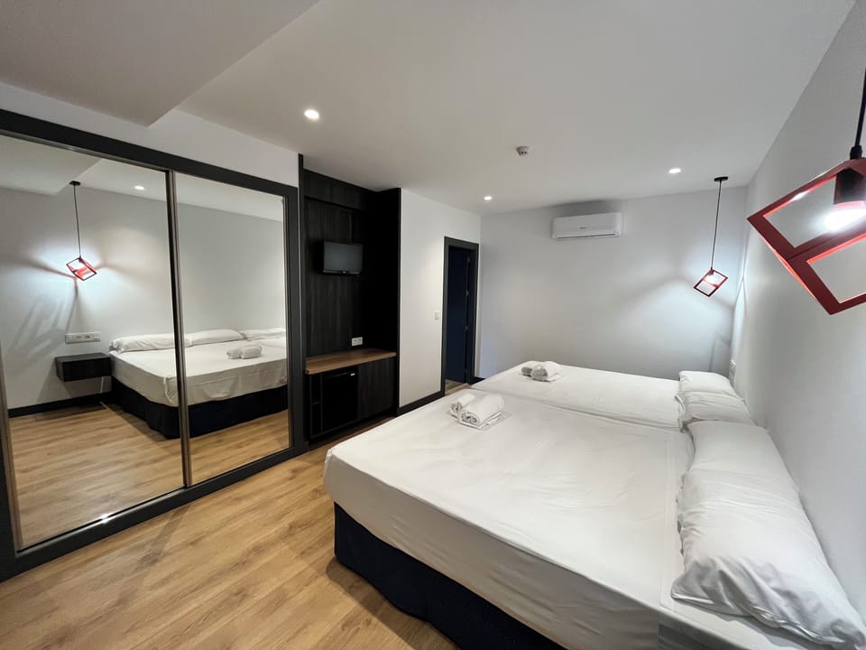 Standard Double or Twin Room | In-room safe, desk, blackout drapes, iron/ironing board