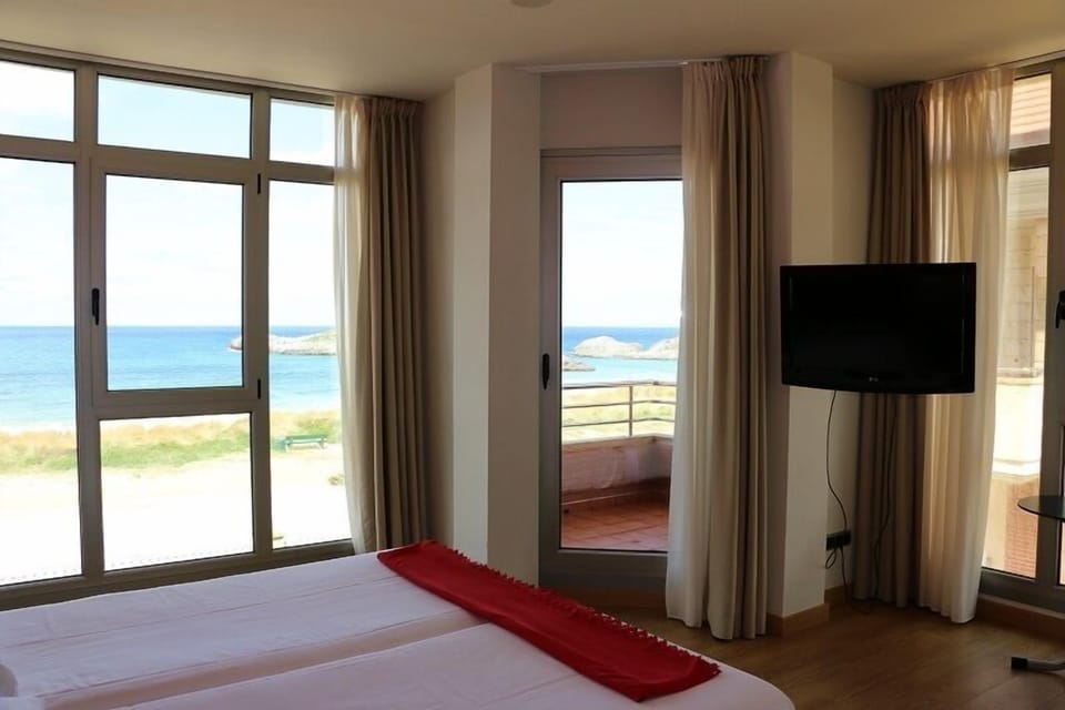 Exclusive Double Room, 2 Twin Beds, Beach View | Minibar, in-room safe, desk, blackout drapes