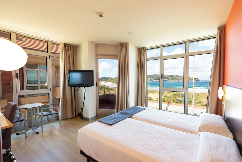 Exclusive Double Room, 2 Twin Beds, Beach View | Minibar, in-room safe, desk, blackout drapes