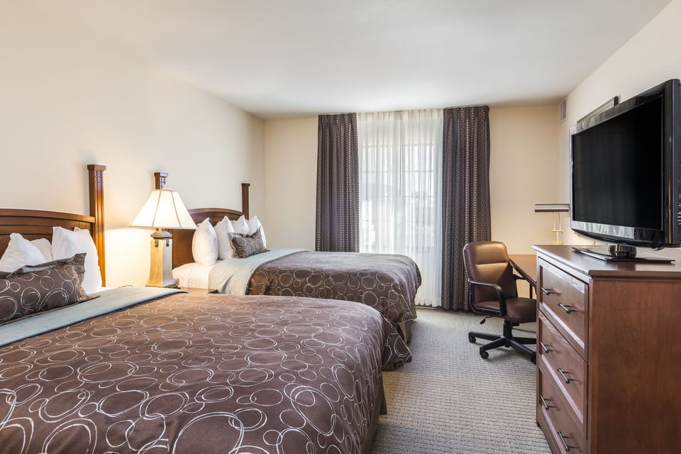 Premium bedding, individually furnished, desk, laptop workspace