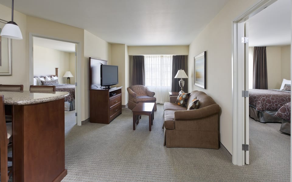 Suite, 2 Bedrooms, Accessible (1 King, Comm, Tub) | Premium bedding, individually furnished, desk, laptop workspace