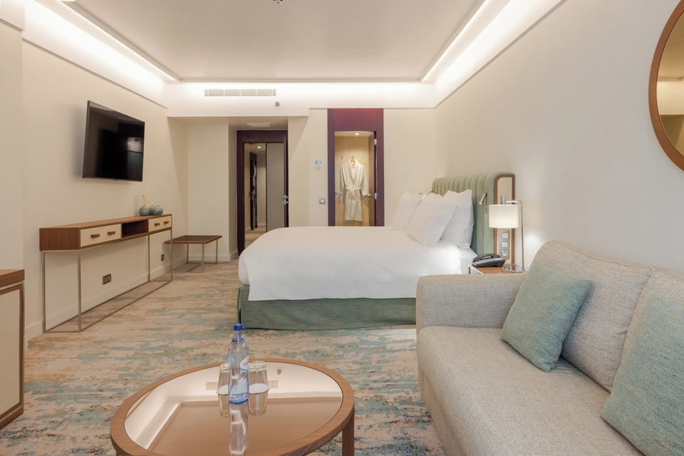 Junior Suite, 1 King Bed with Sofa bed (High Floor) | Premium bedding, minibar, in-room safe, desk