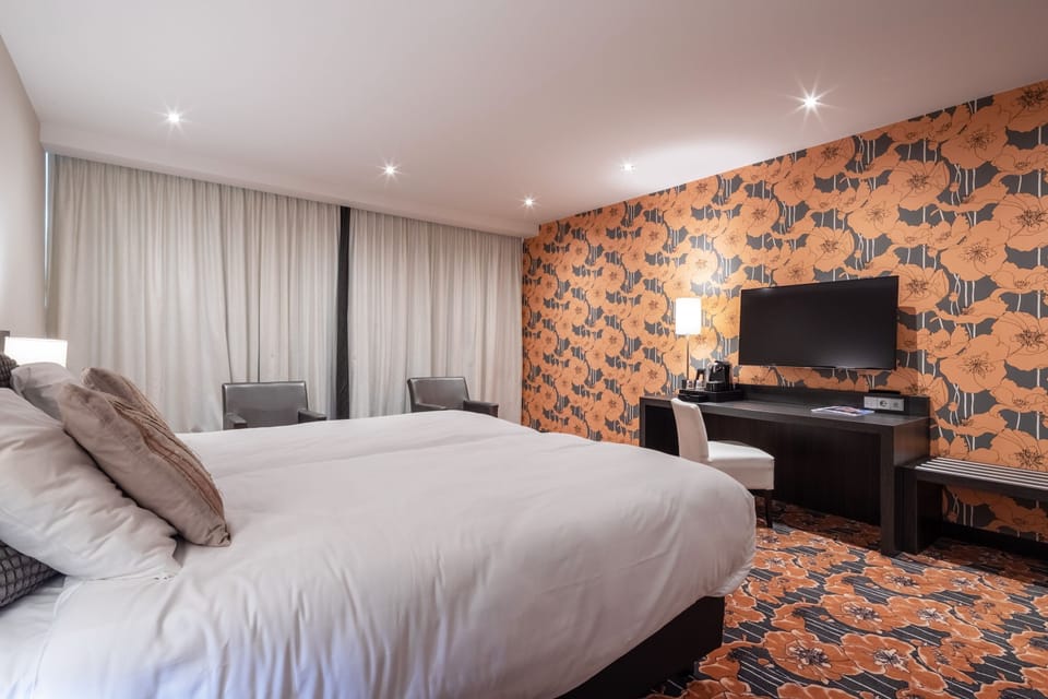 Deluxe Room, 2 Twin Beds | In-room safe, desk, laptop workspace, blackout drapes