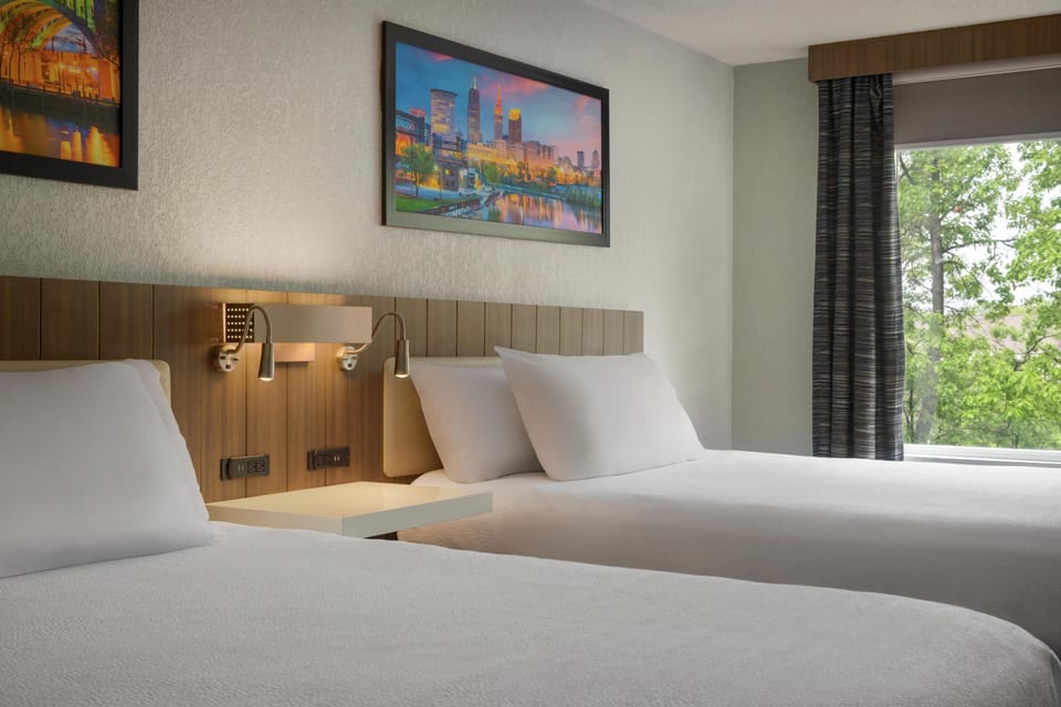 Desk, blackout drapes, iron/ironing board, cribs/infant beds