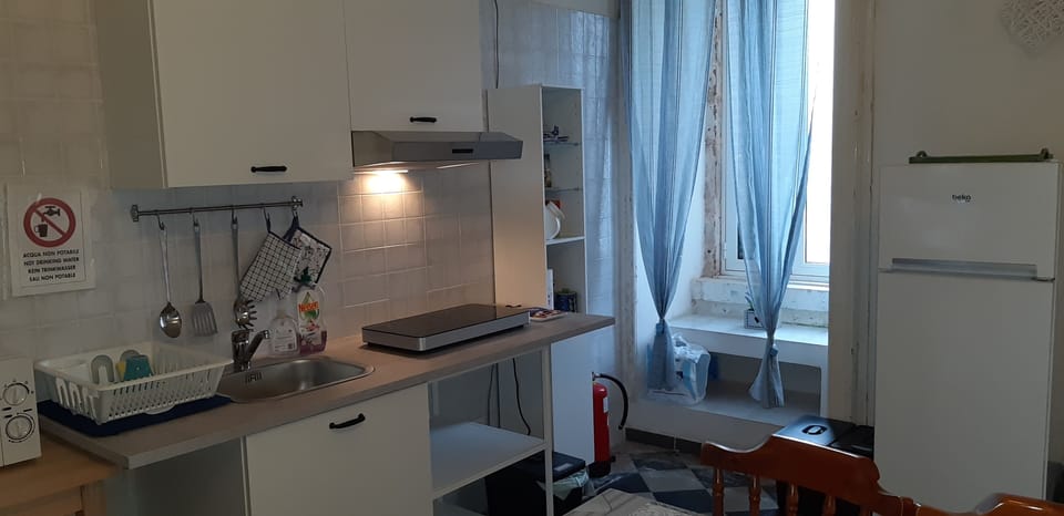 Full-size fridge, microwave, stovetop, toaster