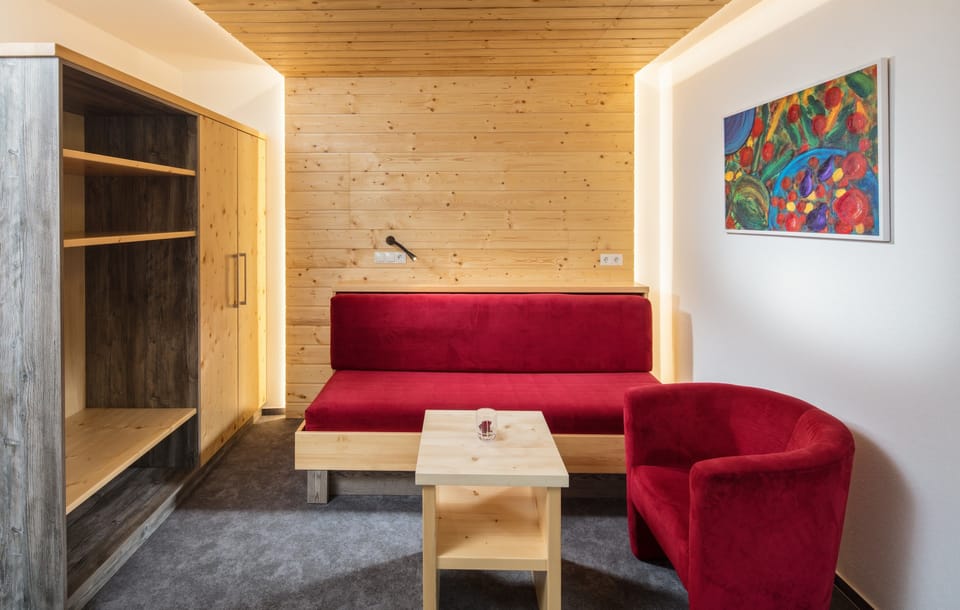 Deluxe Apartment, Kitchenette | Living area | 42-inch flat-screen TV with satellite channels, TV