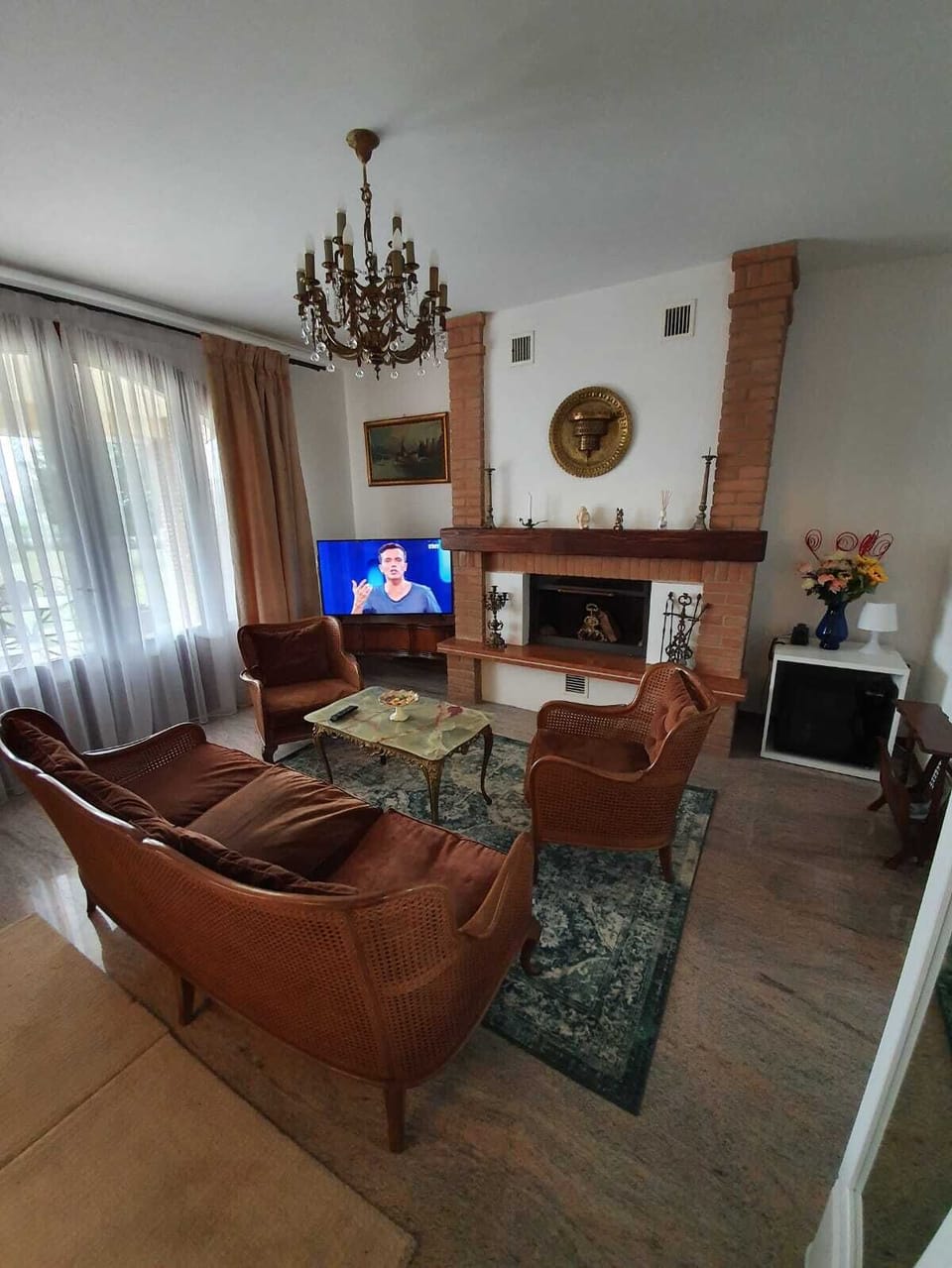 Luxury Suite, Jetted Tub | Living room | Flat-screen TV