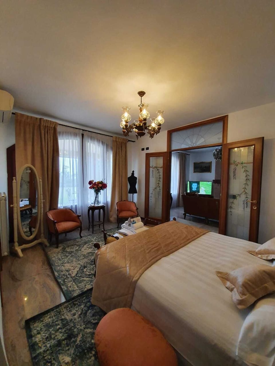 Luxury Suite, Jetted Tub | Minibar, in-room safe, individually decorated, desk