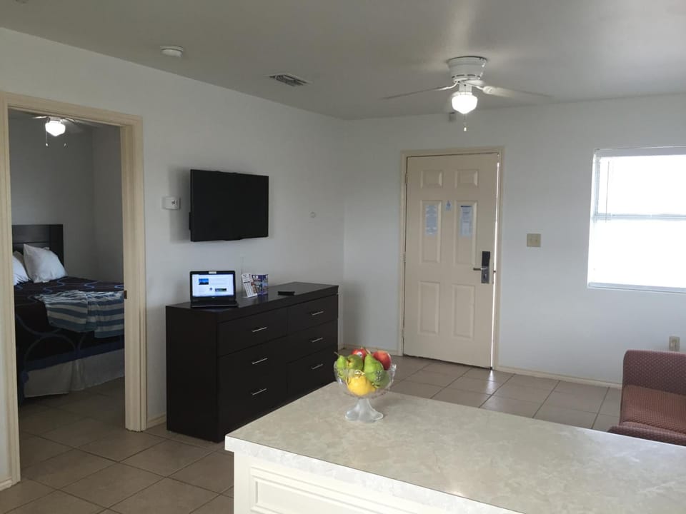 40-inch flat-screen TV with cable channels, TV