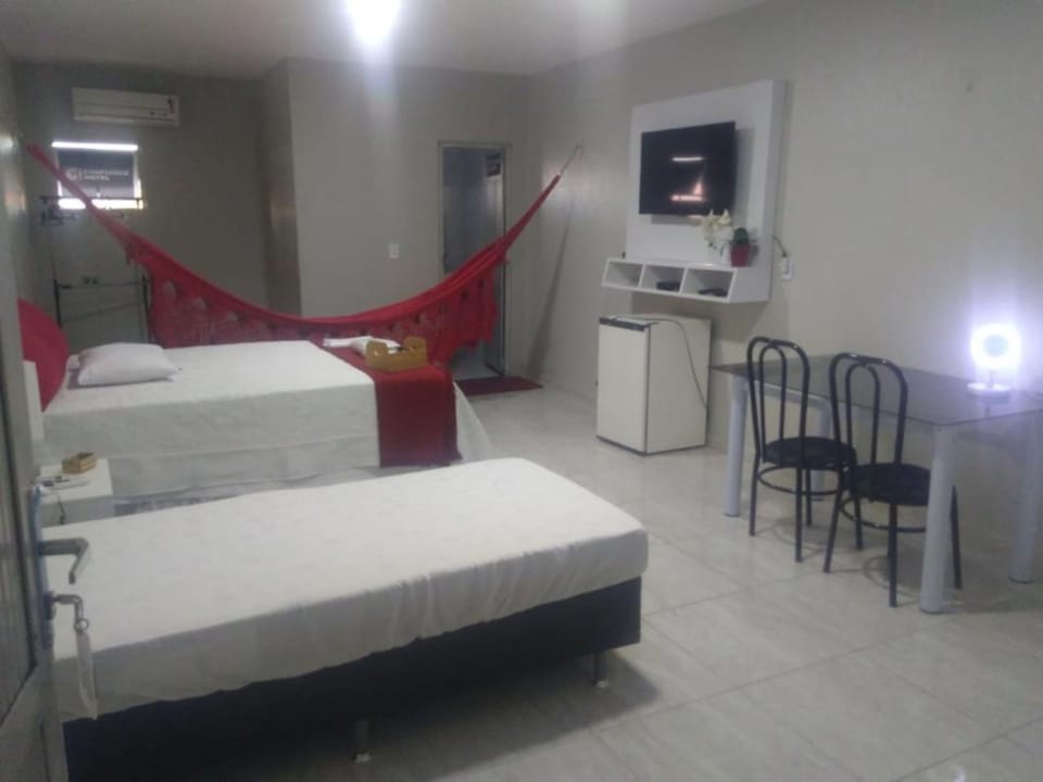 Deluxe Triple Room | Minibar, iron/ironing board (on request), WiFi (free)