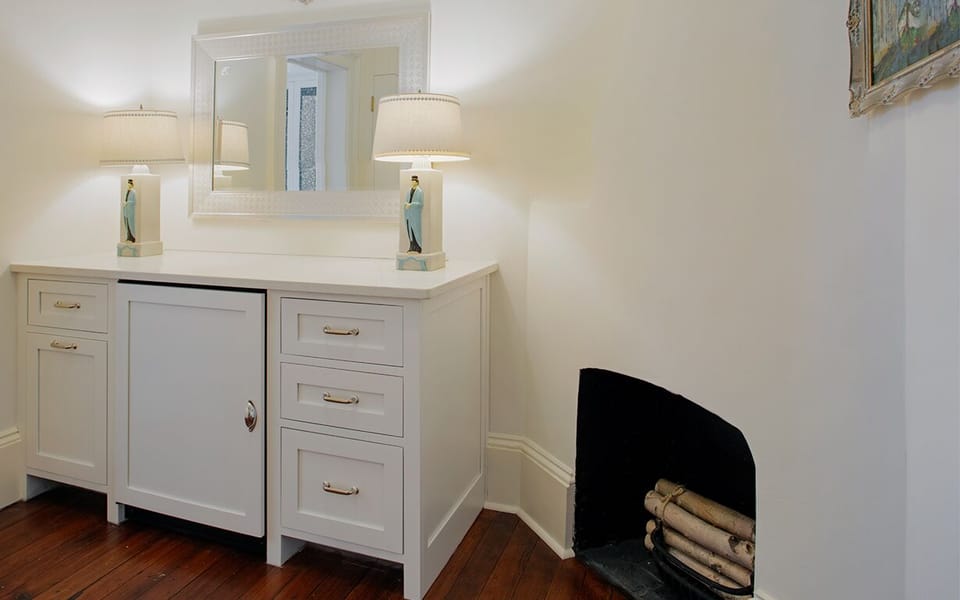 A mini-fridge has been conveniently placed between both rooms for cold refreshments.