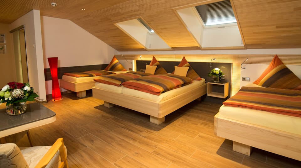 Quadruple Room | Hypo-allergenic bedding, minibar, in-room safe, desk