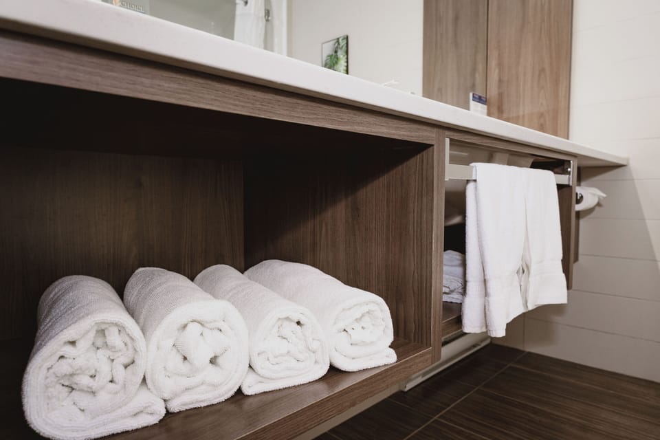 Premium bedding, desk, blackout drapes, soundproofing