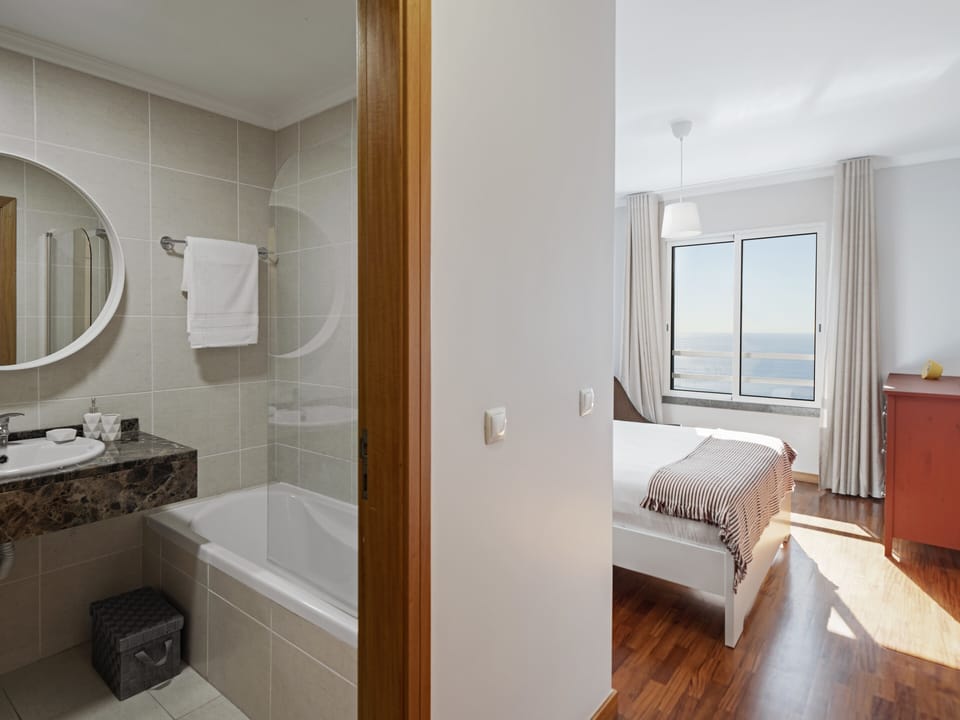 Bedroom with a private bathroom.