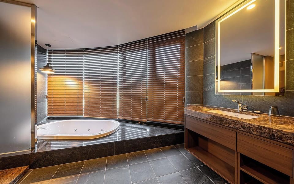 Premium Nordic Sauna(Multi-night Rate) | Bathroom | Separate tub and shower, deep soaking tub, hair dryer, bathrobes