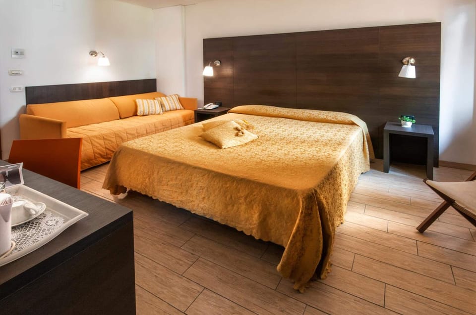 Select Comfort beds, minibar, in-room safe, desk