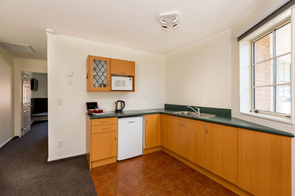 Microwave, stovetop, coffee/tea maker, electric kettle