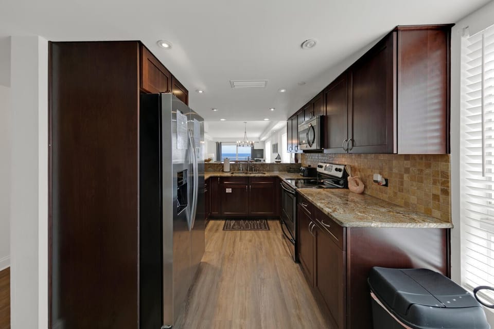 Beautiful updated kitchen with stainless appliances and granite countertops!