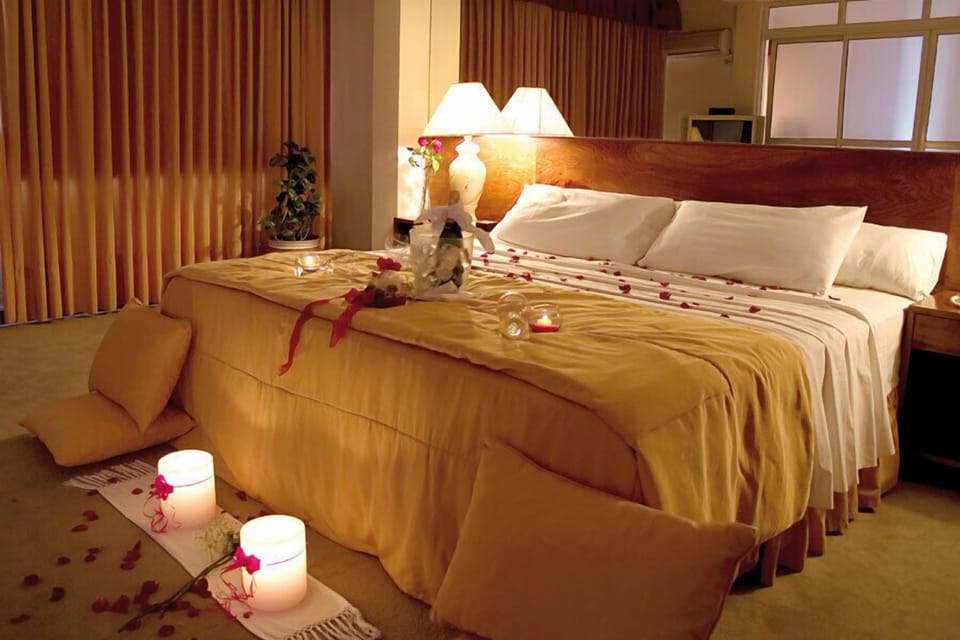 Deluxe Room | Minibar, in-room safe, individually furnished, desk