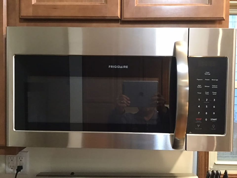 New stainless programmable microwave. Enjoy a movie and popcorn for a fun night!
